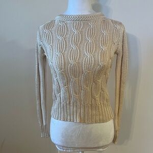 Prettiest spring/summer sweater. Light pinkish color with a touch of sparkle.